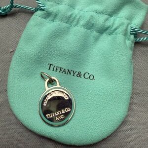 Tiffany & Co. Silver Round Charm with Teal Pouch
